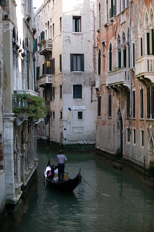 People Art Print featuring the photograph Gondolier Ferrying People Through Canal by Photodisc