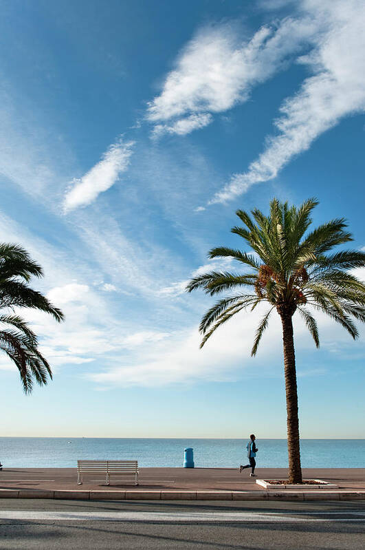 People Art Print featuring the photograph Jogger Along Quai Des Etats-unis by Thomas Winz