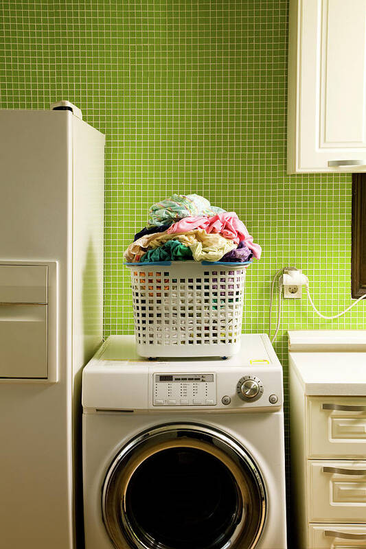 Washing Machine Art Print featuring the photograph Pile Of Laundry On Washing Machine by Jae Rew