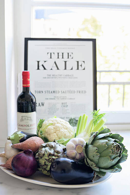 Ip_12315711 Art Print featuring the photograph Plate Of Vegetables, Bottle Of Wine And Framed Article In Front Of Window by Cecilia Mller