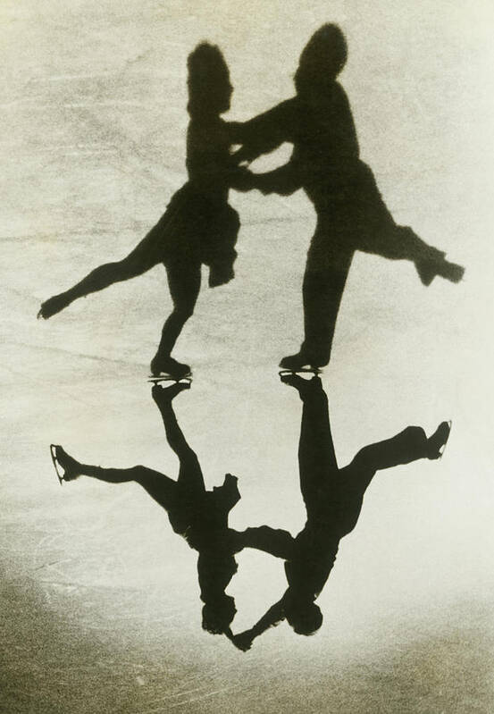 Shadow Art Print featuring the photograph Silhouette Of Couple Ice Skating by Fpg