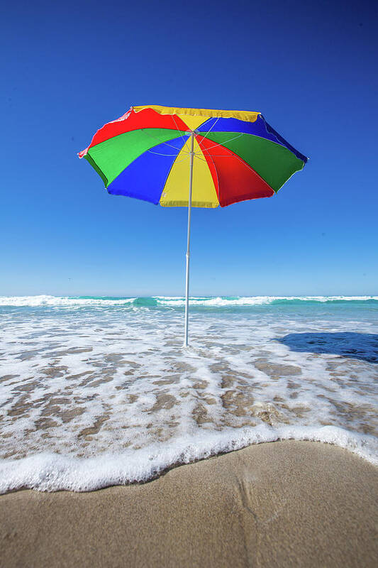 Tranquility Art Print featuring the photograph Umbrella At The Beach by John White Photos