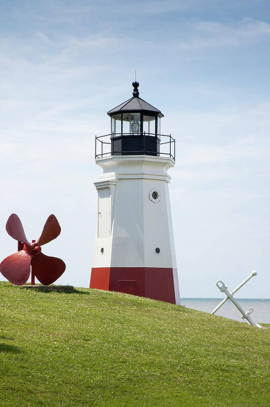 Water's Edge Art Print featuring the photograph Vermillion Lighthouse by Westhoff