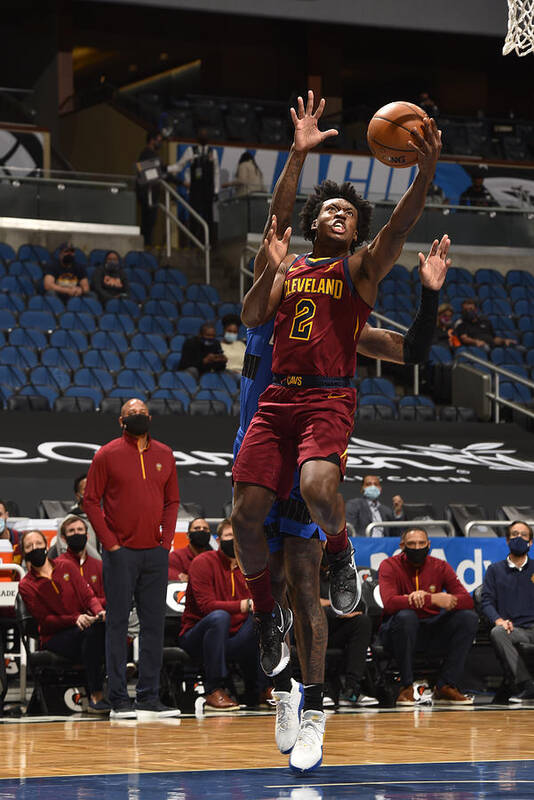 Collin Sexton Art Print featuring the photograph Cleveland Cavaliers v Orlando Magic #1 by Gary Bassing