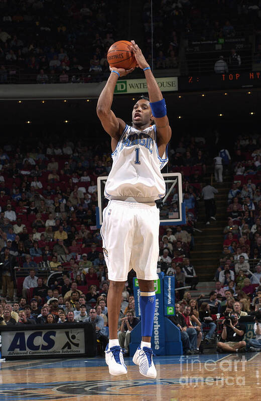 Tracy McGrady of the Toronto Raptors dunks against the Orlando Magic  News Photo - Getty Images