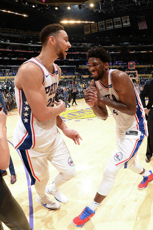 Ben Simmons Art Print featuring the photograph Ben Simmons and Joel Embiid by Andrew D. Bernstein