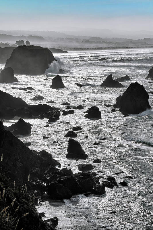 Mendocino Coast Art Print featuring the photograph Black and White Seascape Beneath a Pale Blue Sky on the Mendocino Coast by Kathleen Bishop