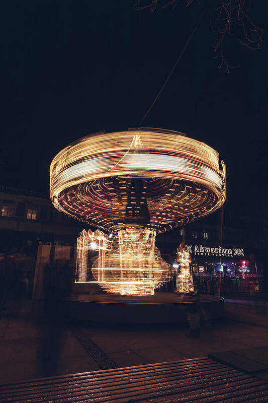 Illuminations Art Print featuring the photograph Christmas carousel on the streets of Warsaw. Fire Wheel by Vaclav Sonnek