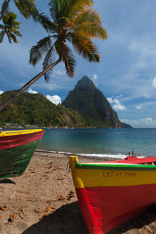 Tranquility Art Print featuring the photograph Colorful boats on the beach in Soufrieire, St Lucia with the Pitons in the background.The famous Pitons of St Lucia are volcanic plugs rising out of the sea at the south end of the island. by Reed Kaestner