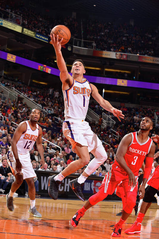 Devin Booker Art Print featuring the photograph Devin Booker and Chris Paul by Barry Gossage