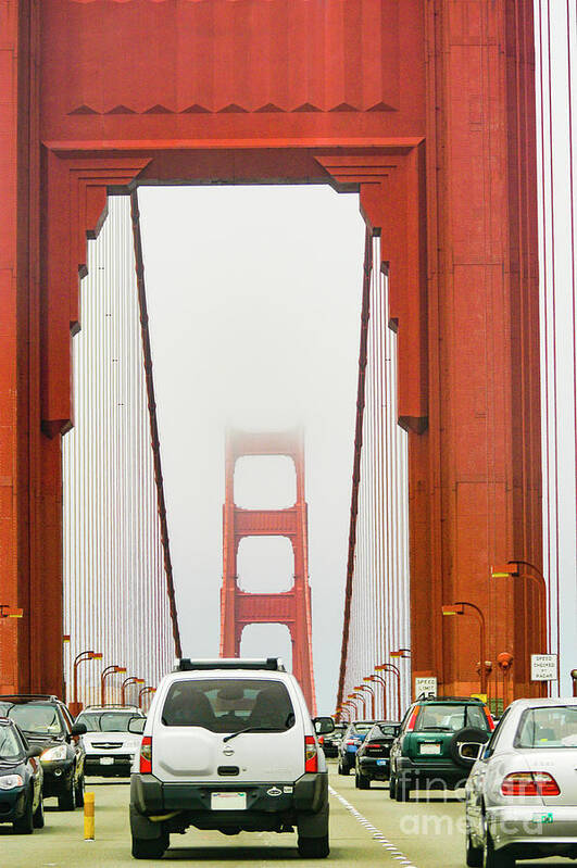 Golden Gate Bridge Art Print featuring the photograph Driving into low clouds and fog on the Golden Gate Bridge by Gunther Allen