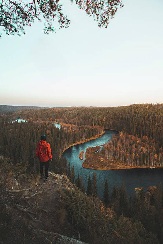 Kuusamo Art Print featuring the photograph Explorer looks at the blue snake, the river which is surrounded by spruce forests by Vaclav Sonnek