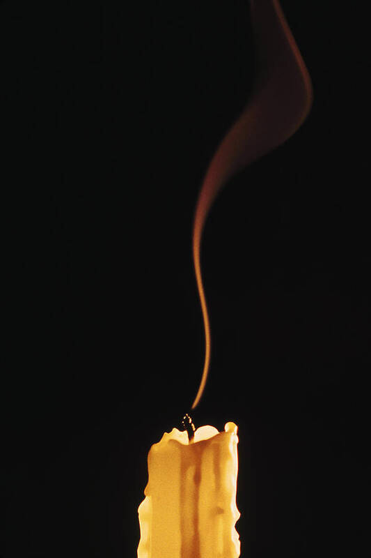 Concepts & Topics Art Print featuring the photograph Extinguished candle by Comstock