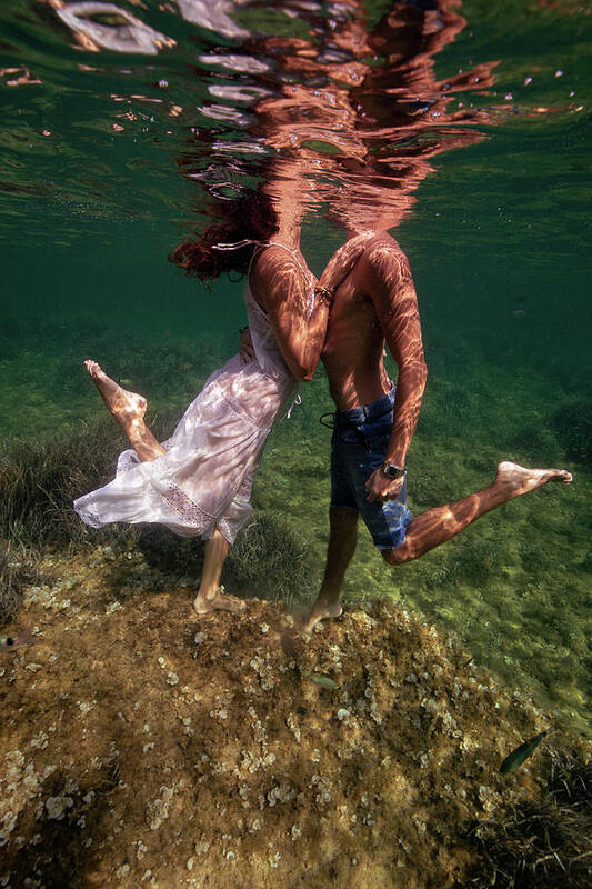 Underwater Art Print featuring the photograph Loving by Gemma Silvestre