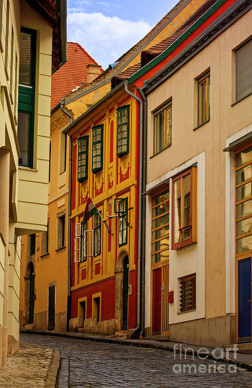 Old Art Print featuring the photograph Narrow street with colorful old town houses by Mendelex Photography