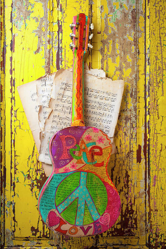 Musical Art Print featuring the photograph Peace love Guitar Hanging On Old Yellow Door by Garry Gay