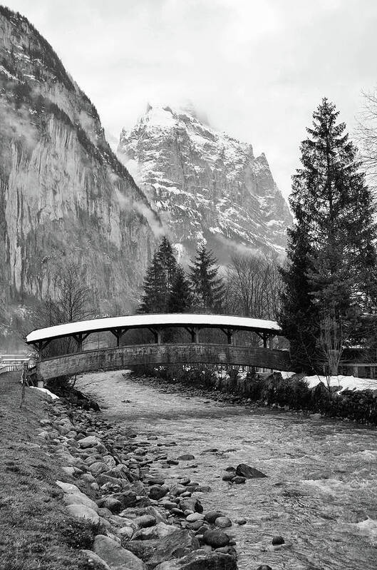Covered Bridge Art Print featuring the photograph Snow Covered Footbridge in Jungfrau Village of Lauterbrunnen Switzerland Black and White by Shawn O'Brien