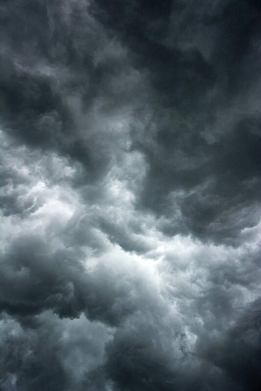 Clouds Art Print featuring the photograph Stormy clouds in the sky. by Bernhard Schaffer