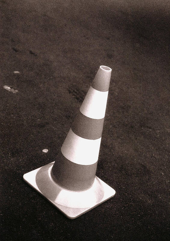 Traffic Cone Art Print featuring the photograph Traffic cone, b&w. by Laurent Hamels