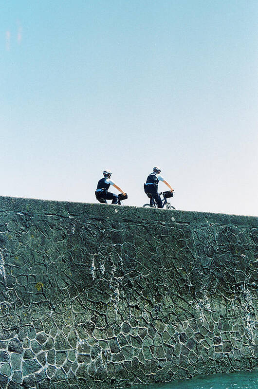 Gendarmes Art Print featuring the photograph Two gendarmes on a ride by Barthelemy de Mazenod