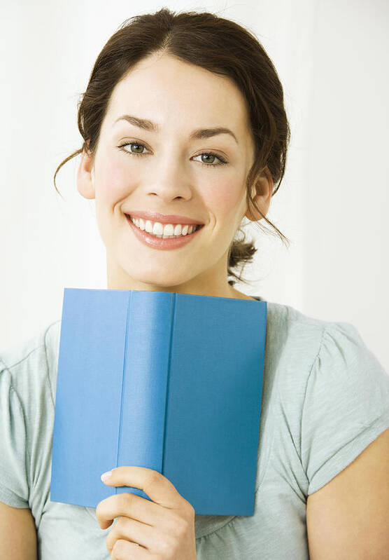 People Art Print featuring the photograph Young woman with book, smiling by Pando Hall