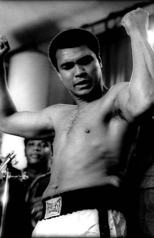 People Art Print featuring the photograph Boxer Muhammad Ali Flexes His Muscles by New York Daily News Archive