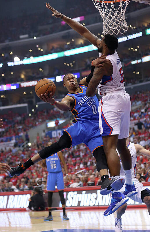 Russell Westbrook Art Print featuring the photograph Deandre Jordan and Russell Westbrook by Stephen Dunn