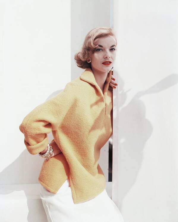 Studio Shot Art Print featuring the photograph Model Wearing Yellow Sweater #1 by Horst P. Horst