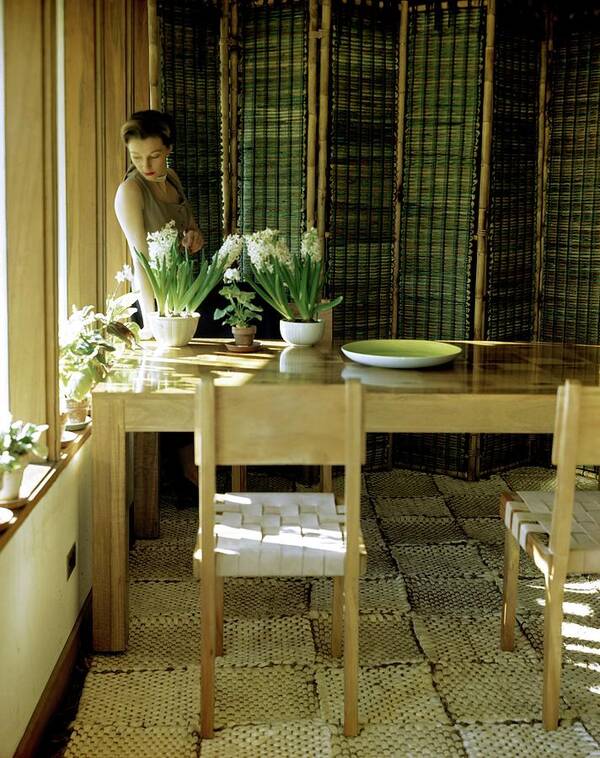 Home Art Print featuring the photograph A Model Posing In A Dining Room by Horst P. Horst