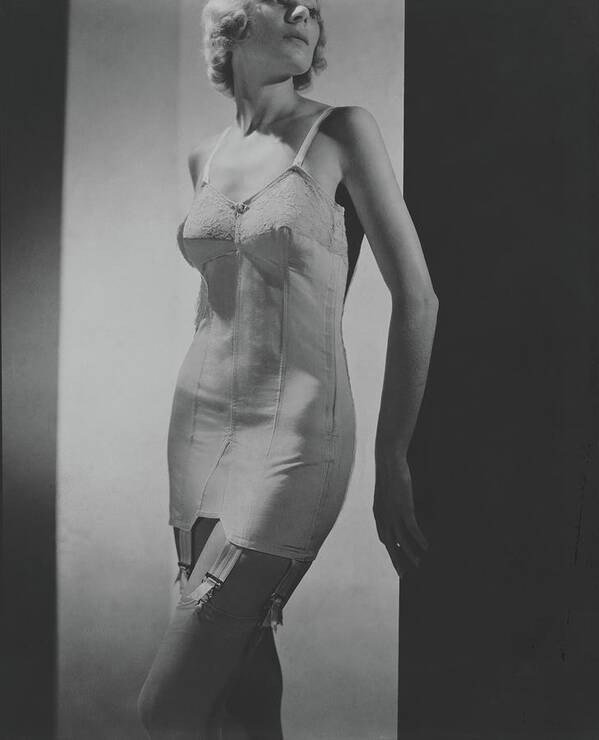 https://render.fineartamerica.com/images/rendered/default/print/6.5/8/break/images-medium-5/a-model-wearing-a-corset-horst-p-horst.jpg