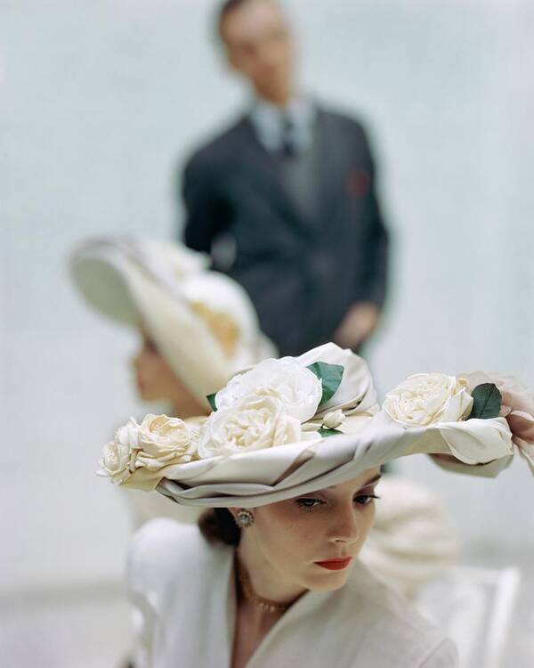 Accessories Art Print featuring the photograph A Model Wearing A Hat Decorated With Flowers by John Rawlings