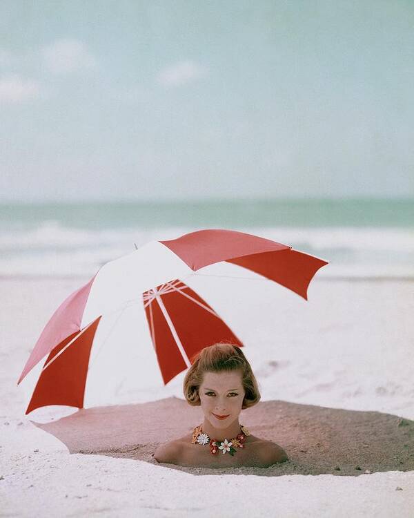 Beauty Art Print featuring the photograph A Woman Buried In Sand At A Beach by Richard Rutledge