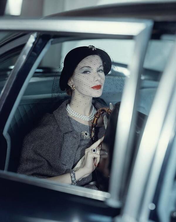 Accessories Art Print featuring the photograph Joan Friedman In A Car by Clifford Coffin