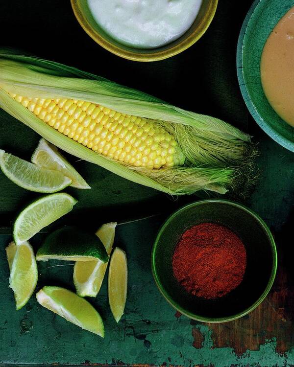 Fruitsvegetablesnobodystudio Shotstill Lifefoodgrainlimefruithealthy Eatingspiceview From Abovefreshready-to-eatprepared Foodcayennesaltmineralcorn On The Cobmayonnaisesalt #condenastgourmetphotograph September 1st 2006 Art Print featuring the photograph Sweetcorn And Limes by Romulo Yanes