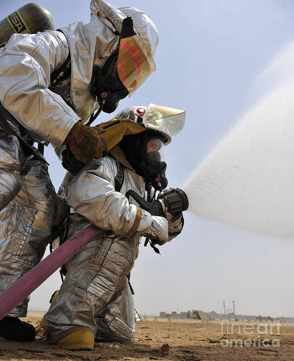 Teamwork Art Print featuring the photograph Firemen Learn How To Effectively Work by Stocktrek Images
