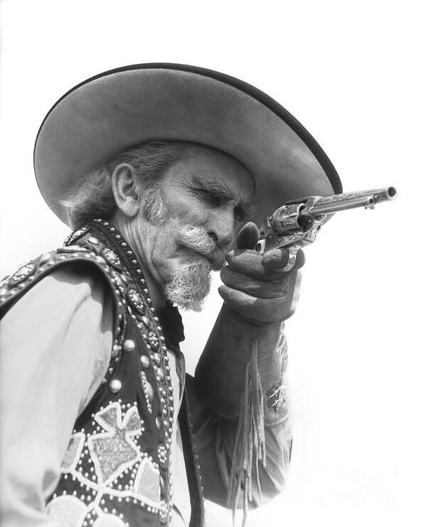 1890s Art Print featuring the photograph Cowboy Aiming A Gun, C.1930s by H. Armstrong Roberts/ClassicStock