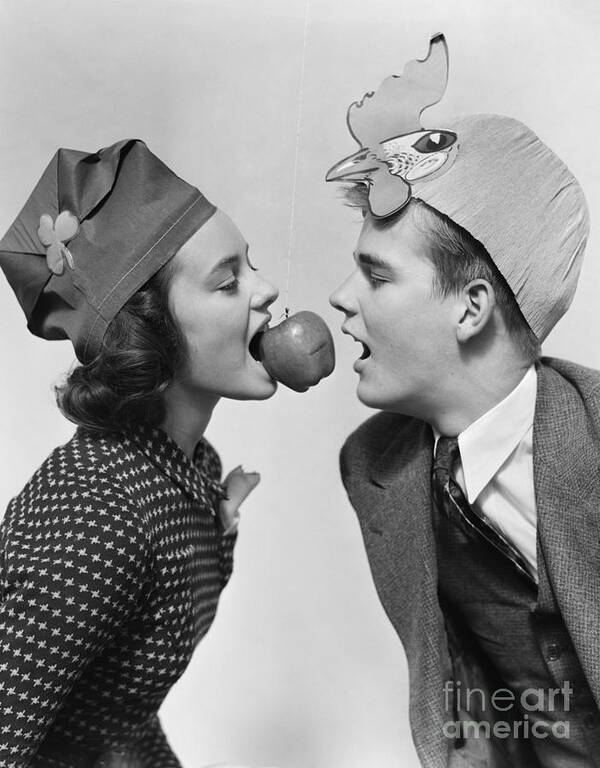 1940s Art Print featuring the photograph Teen Girl And Boy Bobbing For Apple by H. Armstrong Roberts/ClassicStock