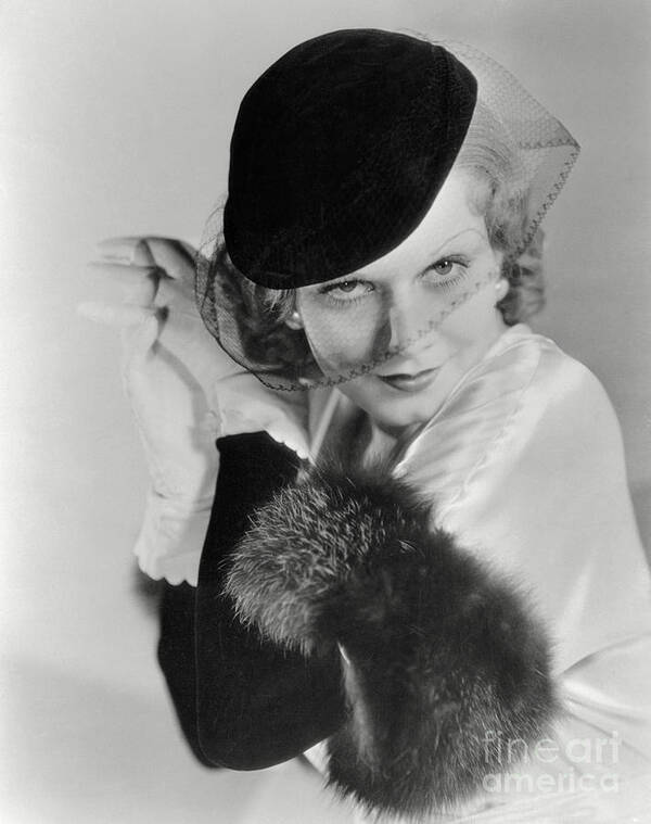Jean Harlow Art Print featuring the photograph Actress Jean Harlow Posing In Hat by Bettmann