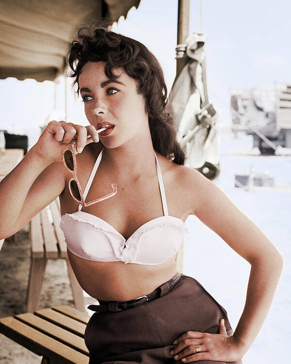 1955 Art Print featuring the photograph Elizabeth Taylor With Sunglasses On Set Of Giant by Frank Worth