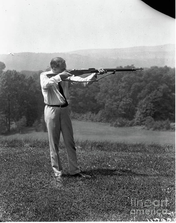 Rifle Art Print featuring the photograph Franklin D. Roosevelt Aiming Rifle by Bettmann