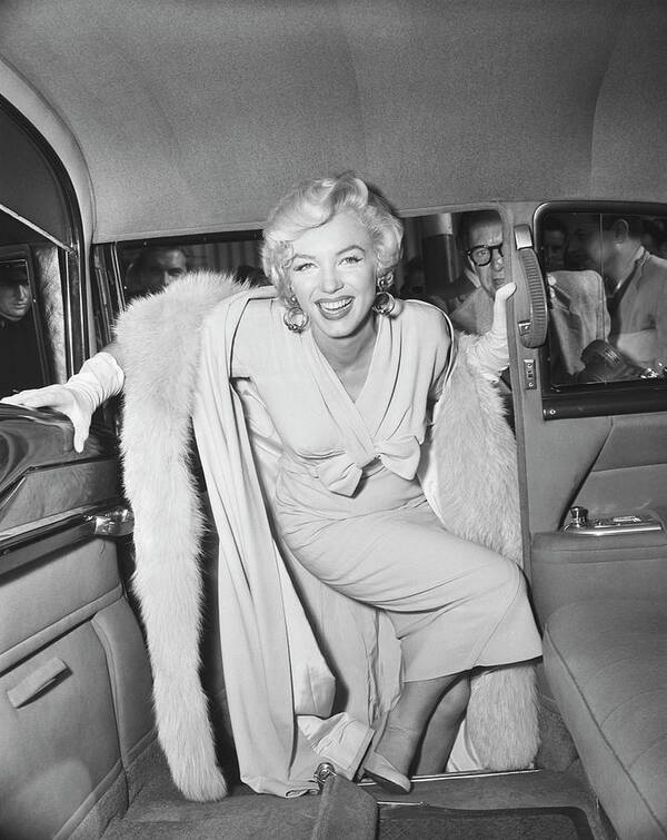 People Art Print featuring the photograph Marilyn Monroe Boarding A Car by Bettmann