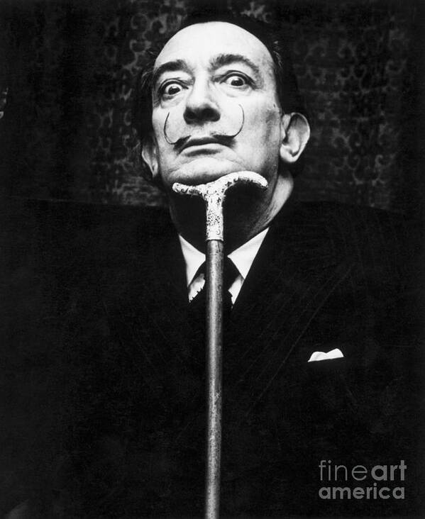 Mature Adult Art Print featuring the photograph Salvador Dali Resting His Head On Cane by Bettmann