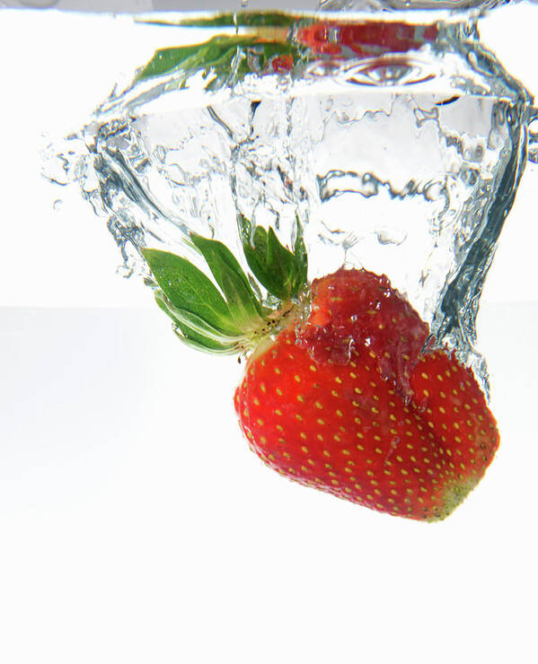 Underwater Art Print featuring the photograph Strawberry Dropping Underwater by Sami Sarkis