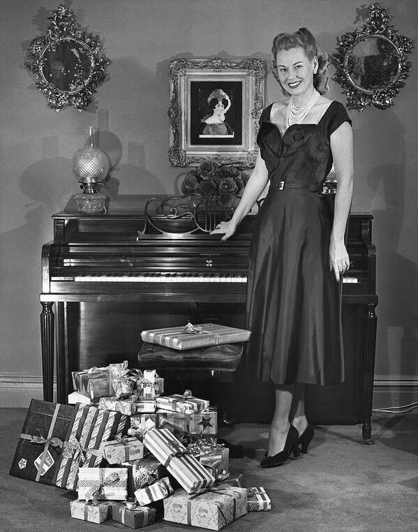 Piano Art Print featuring the photograph Woman Standing By Piano & Presents by George Marks
