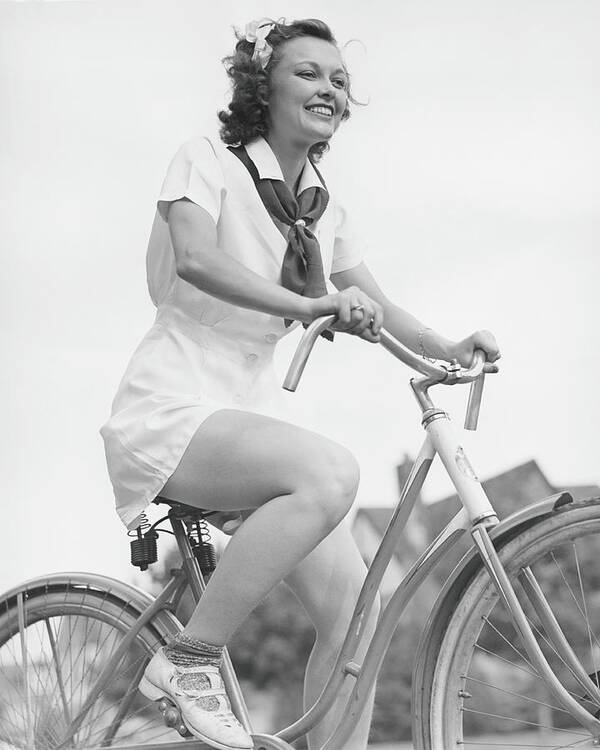 People Art Print featuring the photograph Young Woman Riding Bicycle, B&w, Low by George Marks