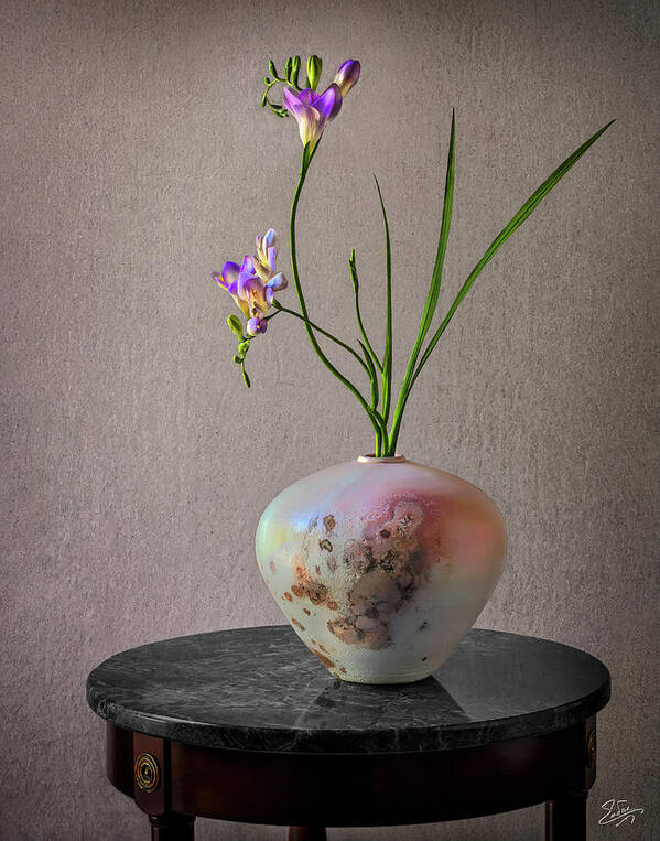 Freesia Art Print featuring the photograph A Raku Vase With Freesias by Endre Balogh