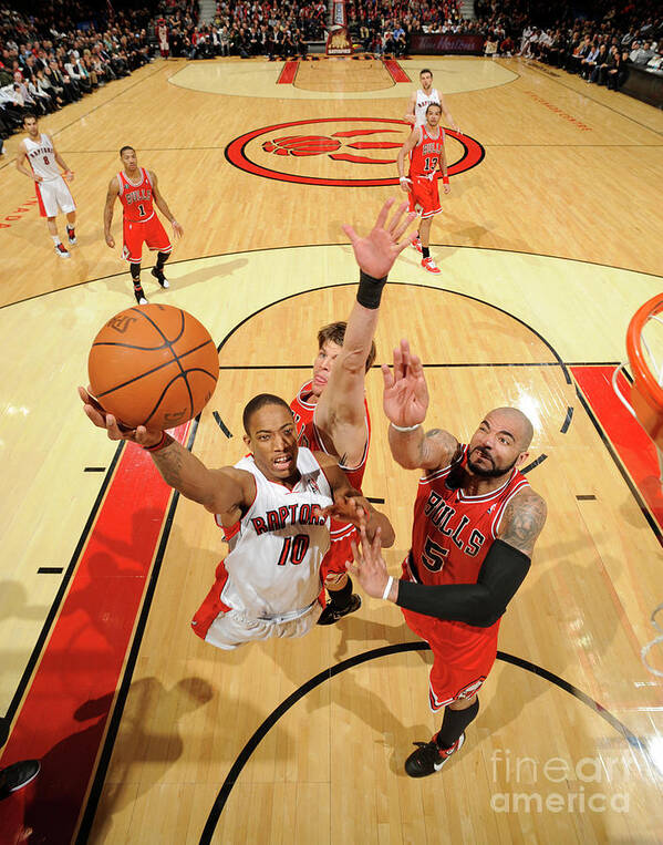 Nba Pro Basketball Art Print featuring the photograph Carlos Boozer and Demar Derozan by Ron Turenne