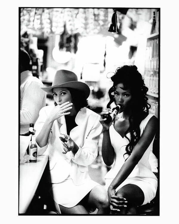 Accessories Art Print featuring the photograph Christy Turlington and Naomi Campbell at the Central Grocery, New Orleans by Arthur Elgort