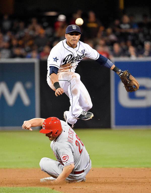 Double Play Art Print featuring the photograph Everth Cabrera and Chris Heisey by Denis Poroy