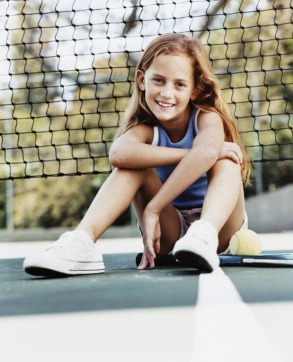 Tennis Art Print featuring the photograph Portrait of a Young Girl Sitting on a Tennis Court by the Net by Digital Vision.